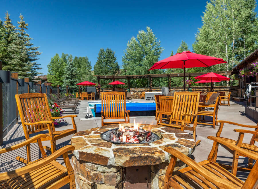 Enjoy the crisp mountain air around a roaring fire pit, perfect for evening gatherings.
