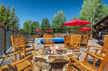 Enjoy the crisp mountain air around a roaring fire pit, perfect for evening gatherings.