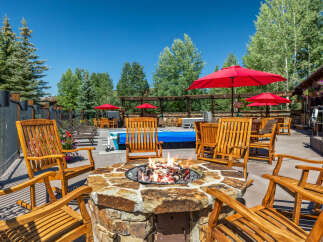 Enjoy the crisp mountain air around a roaring fire pit, perfect for evening gatherings.