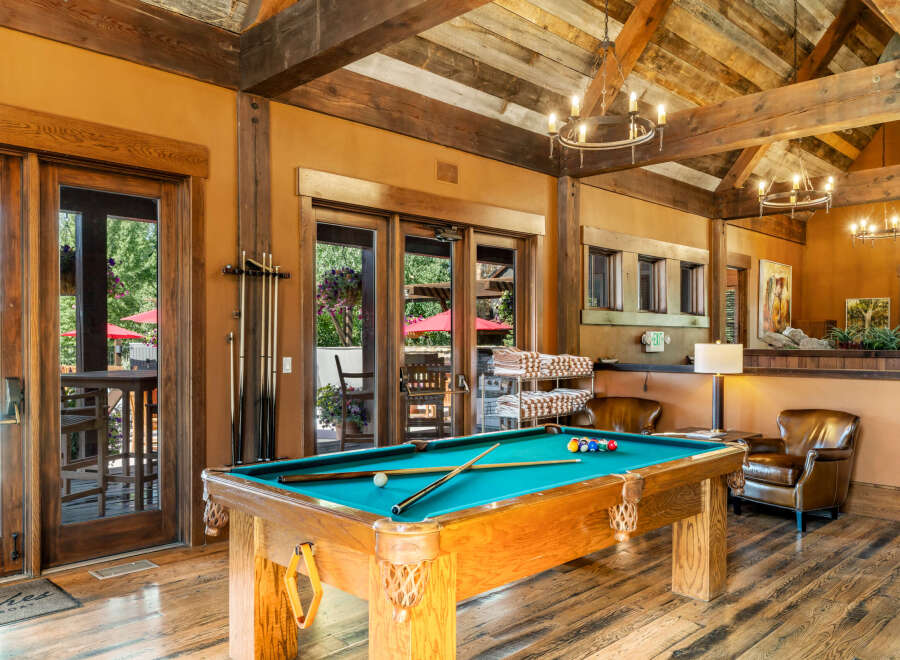 Experience ultimate relaxation and entertainment in this stunning recreational space, featuring a professional billiard table perfect for friendly games.