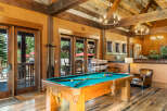 Experience ultimate relaxation and entertainment in this stunning recreational space, featuring a professional billiard table perfect for friendly games.