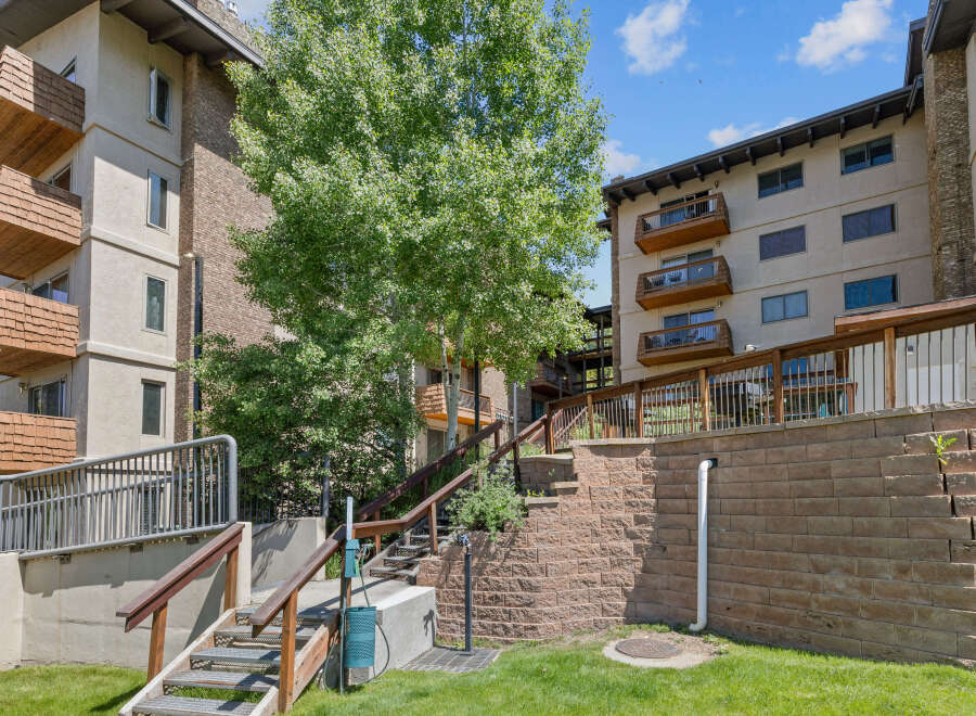 Discover this charming property featuring multiple levels of living space, each with private balconies offering scenic views.