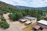 Discover this charming property nestled amidst breathtaking mountain views and lush greenery.