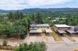 Discover this charming duplex offering comfortable living spaces and convenient covered parking.