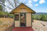 Discover this charming small cabin, perfect for a getaway or a cozy retreat.