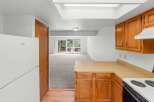 Discover this charming home featuring a bright and airy living space with a large skylight and ample natural light.