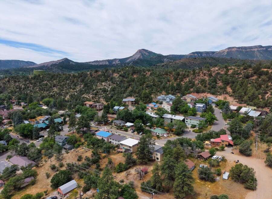 Discover this charming mountain town nestled amidst lush greenery and rolling hills.