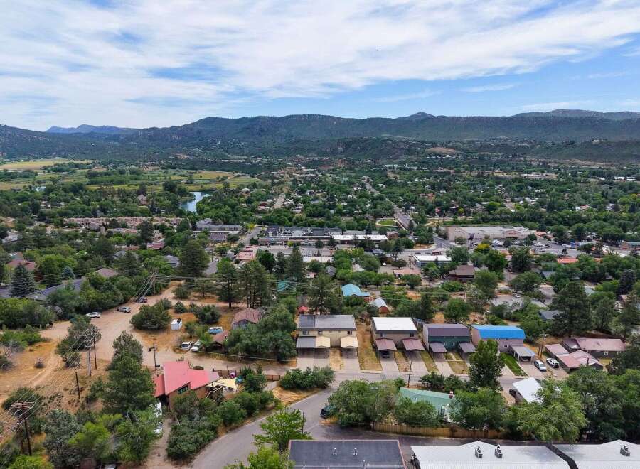 Discover this charming property nestled amidst lush greenery and scenic mountain views.