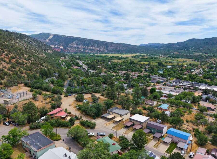 Discover this charming property nestled amidst lush greenery and scenic mountain views.