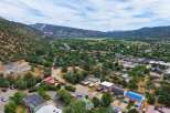 Discover this charming property nestled amidst lush greenery and scenic mountain views.