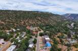 Discover this charming property nestled in a picturesque mountain setting, offering a unique blend of natural beauty and community living.
