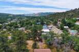 Discover this charming property nestled amidst lush greenery and scenic mountain views.