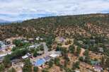 Discover this charming residential area nestled against a scenic hillside, offering a peaceful retreat with stunning natural surroundings.