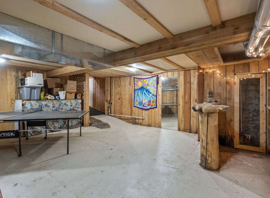 Discover a unique basement space perfect for recreation and storage.