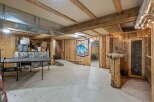 Discover a unique basement space perfect for recreation and storage.