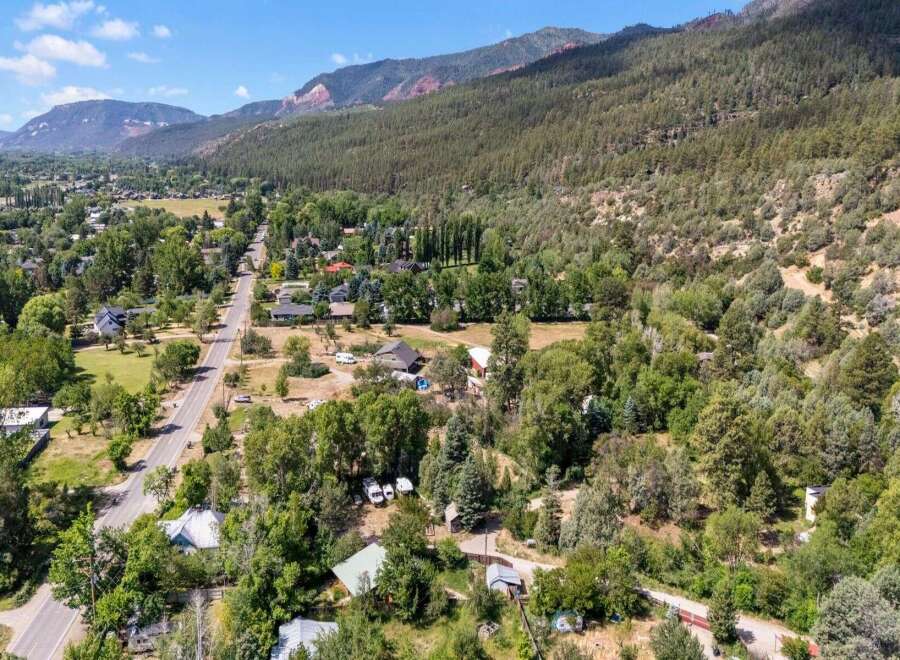 Discover this charming property nestled amidst lush greenery and scenic mountain views.