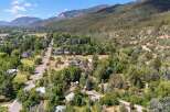 Discover this charming property nestled amidst lush greenery and scenic mountain views.