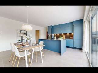 Experience modern living in this stunning open-concept kitchen and dining area.