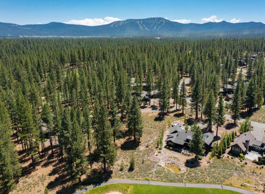 Nestled amidst a dense pine forest, this stunning property offers a serene and private retreat.