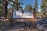 Discover Gray's Crossing, a premier real estate development nestled amidst the natural beauty of tall pine trees.