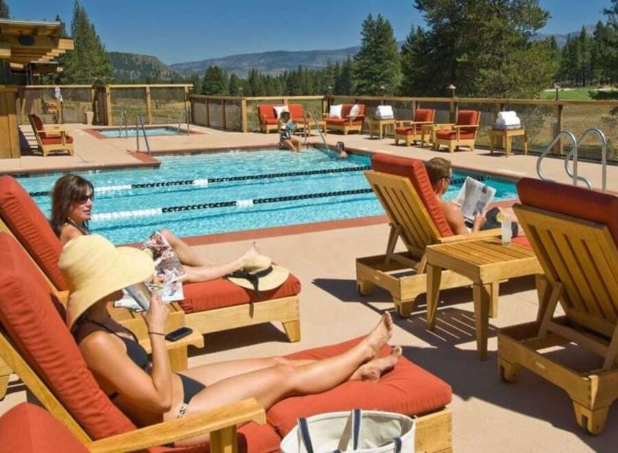 Enjoy a luxurious resort-style living experience with this stunning outdoor pool area, perfect for relaxation and recreation.
