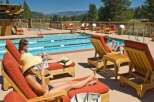 Enjoy a luxurious resort-style living experience with this stunning outdoor pool area, perfect for relaxation and recreation.