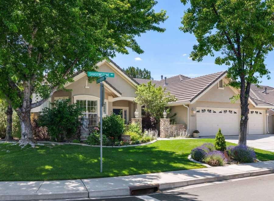 Welcome to this charming single-story home located at the desirable intersection of Shadowstone Way and Sutterbrook.