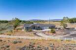 Discover this stunning single-story home featuring a spacious layout and a welcoming facade.