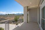Enjoy breathtaking mountain views from this charming property's covered porch.