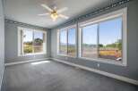 Experience breathtaking views from this spacious room, featuring large windows that flood the space with natural light.