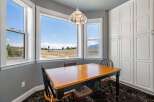 Enjoy breathtaking mountain views from this charming breakfast nook, perfect for morning coffee or intimate meals.