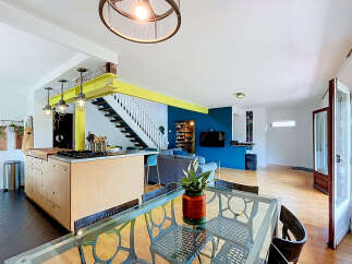Discover this open-concept living space, perfect for modern living and entertaining.