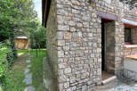 Discover this charming stone-built property, featuring rustic stonework and a welcoming entrance.