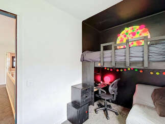 Discover this unique loft bed setup, perfect for maximizing space in a child's room.
