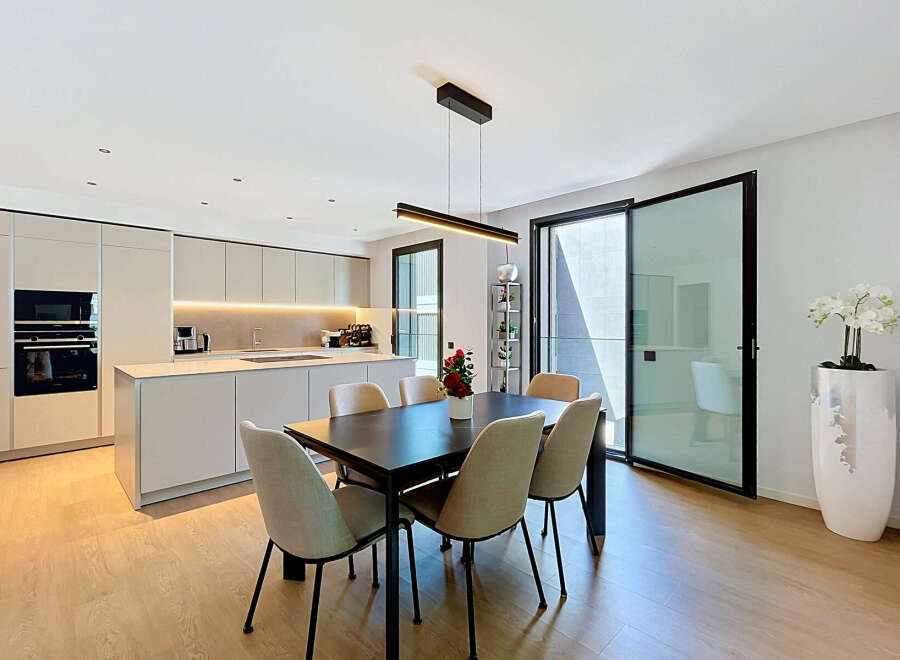 Experience modern living in this stunning open-plan kitchen and dining area.