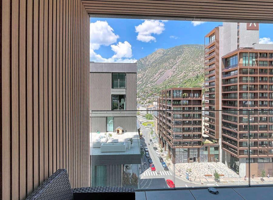 Experience modern living with stunning mountain views from this exquisite property.