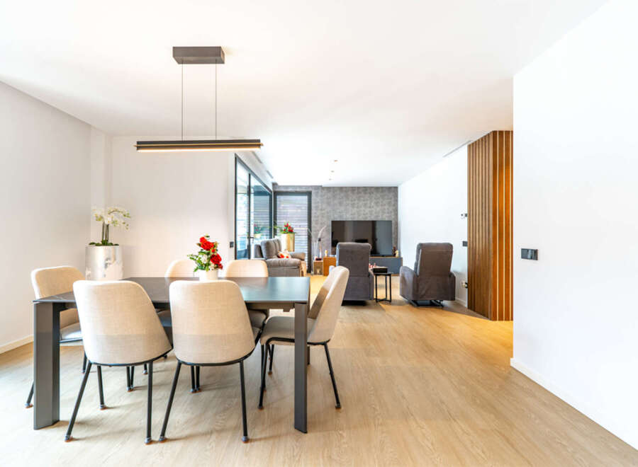Experience modern living in this spacious open-concept dining and living area.