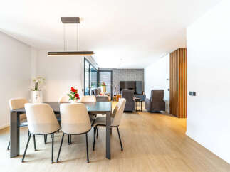 Experience modern living in this spacious open-concept dining and living area.