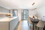 Experience modern living in this stunning open-plan kitchen and dining area.