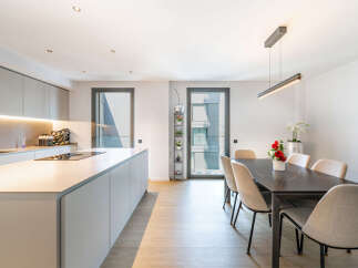 Experience modern living in this stunning open-plan kitchen and dining area.