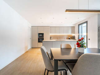 Experience modern living in this stunning open-plan kitchen and dining area.