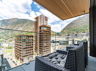 Experience luxury living with this stunning balcony view, offering panoramic vistas of the surrounding mountains and cityscape.