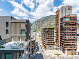 Experience modern urban living in this stunning apartment complex, featuring sleek architecture and breathtaking mountain views.