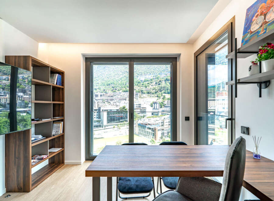 Experience modern living with this stunning apartment featuring a spacious dining area perfect for entertaining.