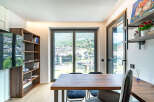 Experience modern living with this stunning apartment featuring a spacious dining area perfect for entertaining.