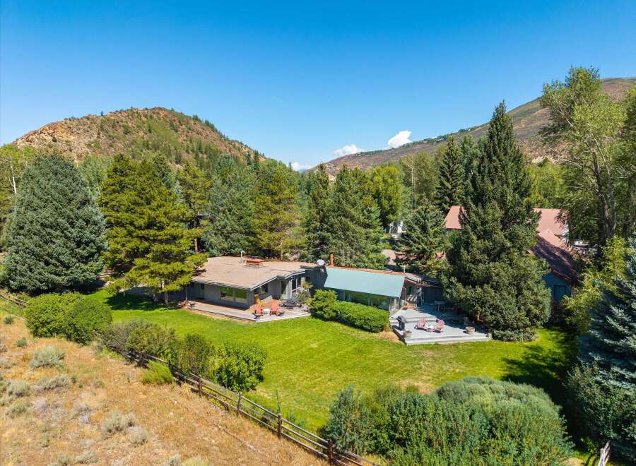 Nestled amidst a serene mountain landscape, this property offers a tranquil retreat with stunning natural beauty.