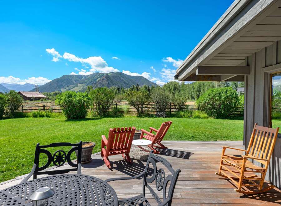 Enjoy breathtaking mountain views from this expansive deck, perfect for outdoor entertaining or quiet relaxation.