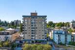 Discover this charming apartment building, featuring a classic mid-rise design with multiple balconies offering city views.