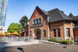 Discover Kelly O'Bryan's Restaurant, a charming brick building with a distinctive architectural style, perfect for a unique dining experience.