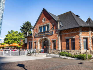 Discover Kelly O'Bryan's Restaurant, a charming brick building with a distinctive architectural style, perfect for a unique dining experience.